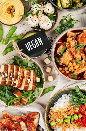 Cooked soy meat dishes on a light background. Healthy food. Vegan diet. Top view.の写真素材