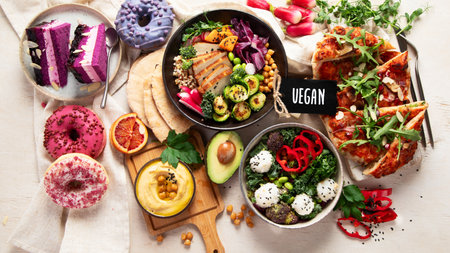 Vegan food on wooden background. Healthy and tasty brunch. Top viewの写真素材