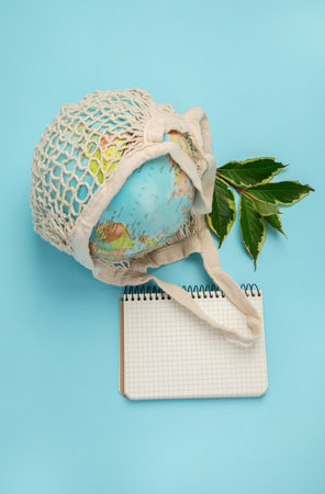 globe on blue background. Environment protection. Top viewの写真素材