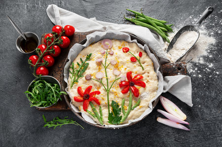 Raw focaccia art on dark background. Italian food concept. Top viewの写真素材