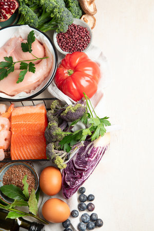 Balanced diet food background. Healthy food selection. Detox and clean diet concept. Foods high in vitamins, minerals and antioxidants. Anti age foods. Top view. Copy space.の写真素材