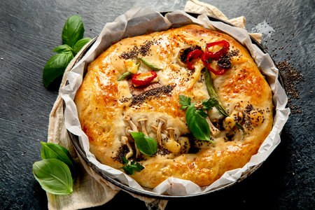 Focaccia art. Italian bread on dark background. Top viewの写真素材