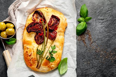 Focaccia art. Italian bread on dark background. Top view, copy spaceの写真素材