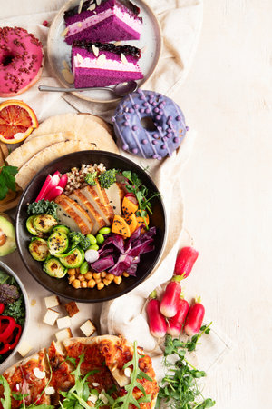 Vegan food on wooden background. Healthy and tasty brunch. Top view, copy spaceの写真素材