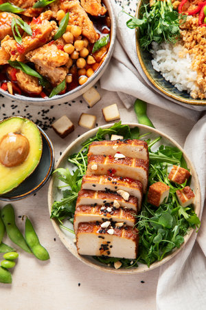 Cooked soy meat dishes on a light background. Healthy food. Vegan diet. Top view.の写真素材