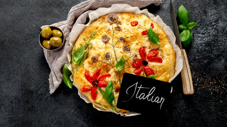 Focaccia art. Italian bread on dark background. Top viewの写真素材