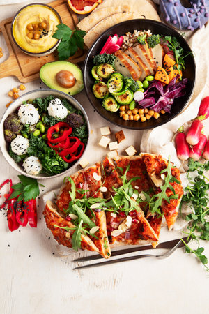 Vegan food on wooden background. Healthy and tasty brunch. Top view, copy spaceの写真素材