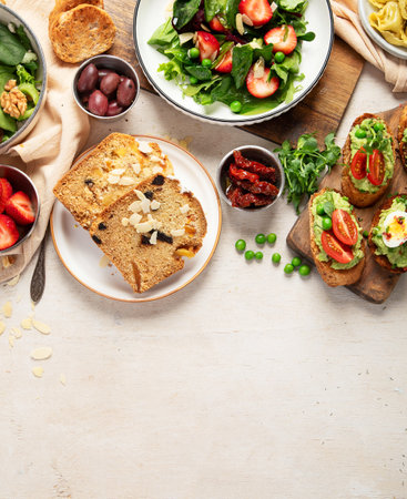 Assortment of various dinner food. Vegetarian seasonal summer food. Top view. Copy space.の写真素材