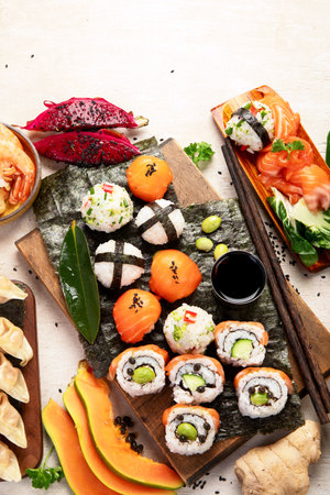 Assorted Asian dishes and snacks on a white background. Traditional food concept. Top view. Copy space.の写真素材