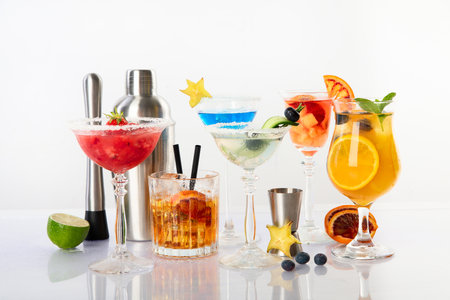 Summer cocktails in classic glasses on a white background. Party time.の写真素材