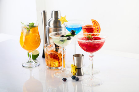 Summer cocktails in classic glasses on a white background. Party time.の写真素材