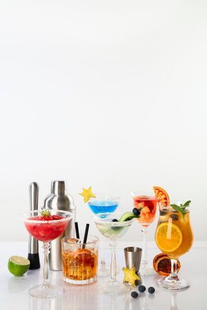 Summer cocktails in classic glasses on a white background. Party time. Copy spaceの写真素材