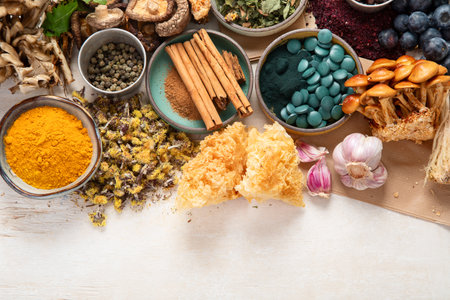 Adaptogen healthy food. Herb and spice collection on light background. Top view, copy spaceの写真素材