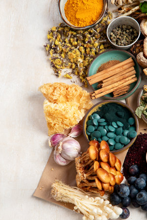 Adaptogen healthy food. Herb and spice collection on light background. Top view, copy spaceの写真素材