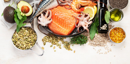 Food rich in omega 3 fatty acids and healthy fats. Healthy keto and low carb diet eating concept. Top view. Panorama with copy space.の写真素材