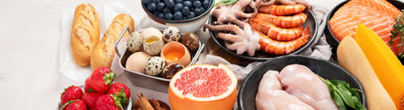 Anti Aging foods on light background. Food for healthy heart, brain and good memory. High in antioxidants, minerals and vitamins. Top view. Panorama with copy space.の写真素材