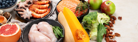 Anti Aging foods on light background. Food for healthy heart, brain and good memory. High in antioxidants, minerals and vitamins. Top view. Panorama with copy space.の写真素材
