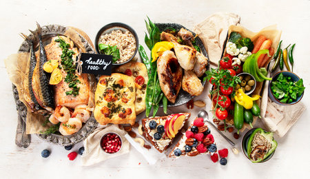 Variety Healthy Food On Table for Lunch or dinner with Vitamins and Antioxidants. Top view, copy spaceの写真素材