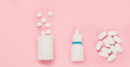 Collection of equipment medicine on pink background. Medical concept. Top view, flat lay, copy space, panoramaの写真素材