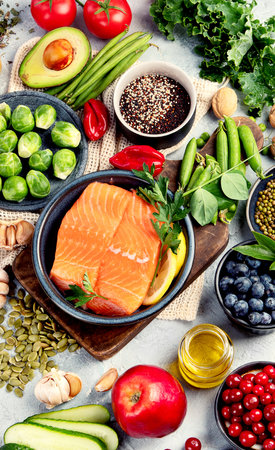 Selection of healthy food on light gray background. Clean eating concept. Top view, flat lay, copy spaceの写真素材