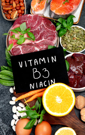 Food high in vitamin B3 on dark background. Healthy diet concept. Top view, flat lay, copy spaceの写真素材