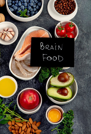Best products for brains on dark gray background. Clean eating concept. Top view, flat lay, copy spaceの写真素材