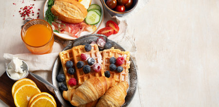 Healthy breakfast set on a light background. The concept of delicious and healthy food. Top view. Panorama with copy space.の写真素材