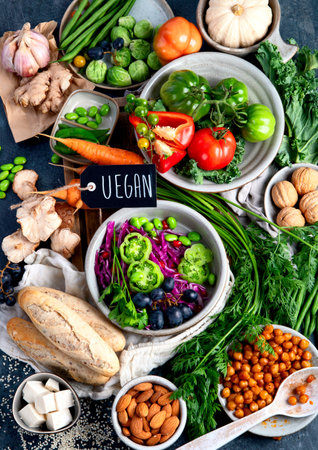 Vegan food assortment on dark background. Healthy food cocnept. Top view, flat layの写真素材