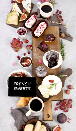 French desserts assortment on gray background. Traditional cuisine concept. Top view, flat layの写真素材