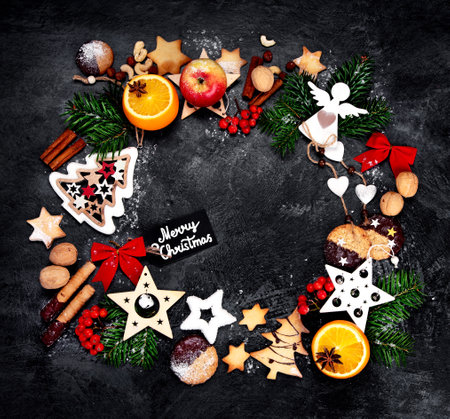 Christmas composition on dark background. Festive background. Top view, flat lay, copy spaceの写真素材