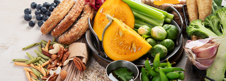 Vegan protein food on a light background. Full set of vegetarian food sources. Healthy eating, diet ingredients. Top view. Panorama with copy space.の写真素材