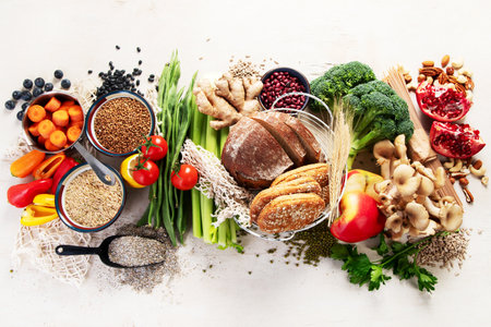High fiber foods for healthy bowel on a white background. Healthy balanced dieting concept. Top view.の写真素材