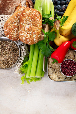 Food lot of carbs on light background. Selection of good sources of carbs. Healthy food concept. Top view. Copy space.の写真素材