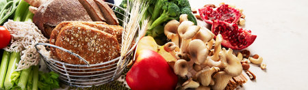 High fiber foods for healthy bowel on a white background. Healthy balanced dieting concept. Top view. Panorama with copy space.の写真素材