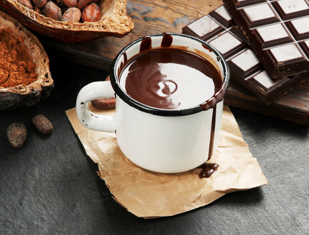 Melted chocolate drink on dark background.の写真素材