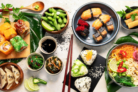 Japanese food assortment on light background. Traditional food concept. Dishes and appetizers. Top view.の写真素材