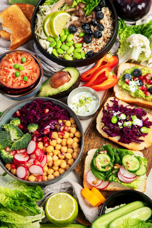 Healthy vegan salads and Buddha Bowls with vitamins, antioxidants, protein on light background. Top view, copy space.の写真素材