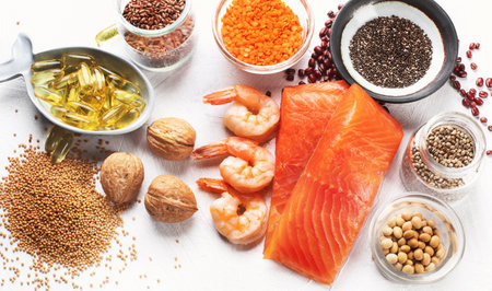 Sources of omega 3, salmon, seeds, nuts. Healthy diet food concept. Top view.の写真素材