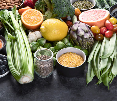 Healthy organic food on a dark background. Vegan and vegetarian diet food concept. Clean eating. Healthy lifestyle. Top view.の写真素材