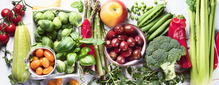 Vegetables and fruits. High in antioxidants, vitamins and fiber for vegans and vegetarians. top view. Panorama.の写真素材