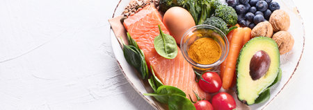 Best food for healthy brain and memory in a plate on a white background. Top view. Panorama with copy space.の写真素材