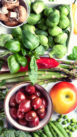 Vegetables and fruits. High in antioxidants, vitamins and fiber for vegans and vegetarians. Top view.の写真素材