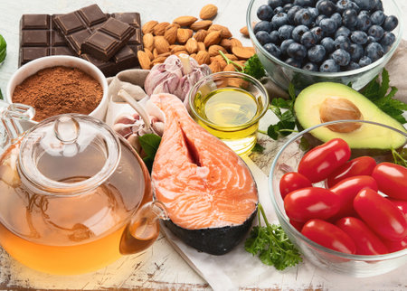 Anti-Aging foods. Foods high in antioxidants, vitamins and minerals on a. gray background. Top view.の写真素材