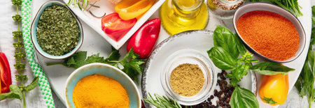 Fresh and dried herbs and spices in a plates. Cooking, healthy eating concept. Top view. Panorama.の写真素材