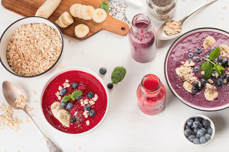 Berries smoothies for Healthy Breakfast on a white background. Healthy and clean diet concept. Top view.の写真素材