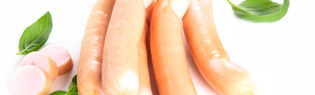 Fresh sausages on white background. Top view. Panorama.の写真素材