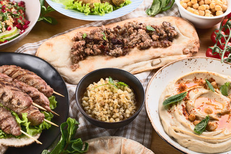 Traditional Turkish cuisine on a wooden background. Middle Eastern food concept. Top view.の写真素材
