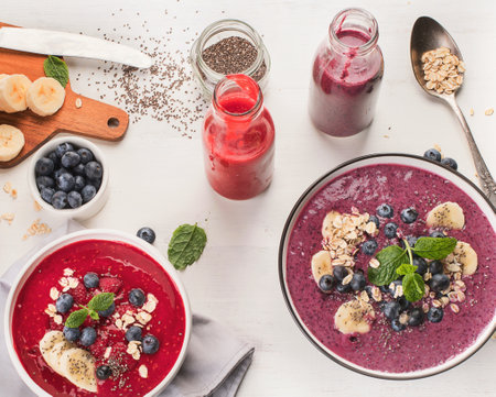 Berries smoothies for Healthy Breakfast on a white background. Healthy and clean diet concept. Top view.の写真素材
