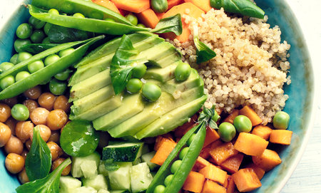 Vegan lunch bowl on a gray background. Healthy eating concept. Top view.の写真素材