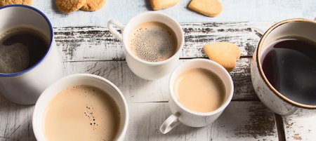 Various cups of coffee on a background. Coffee time concept. Top view. Panorama.の写真素材